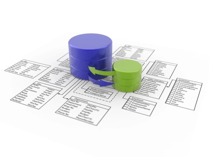 Engineer reviewing database schema diagrams